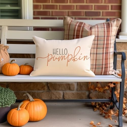 Bench with Hello Pumpkin pillow and small pumpkins